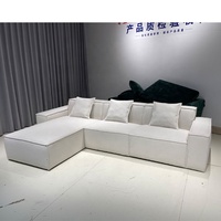 Modernes Anpassbares Stoff-Ecksofa Modulares Sofa Boucle Konvertierbares L-förmiges Wohnzimmer-Sofa Weiße Lagerhaus-Werkstatt Holzbeine
