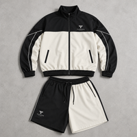 Conjunto Deportivo de Dos Piezas para Hombre con Bloques de Color en Contraste, Chaqueta con Cremallera y Cuello Alto, Pantalones Cortos, Bolsillos Inclinados, Diseño Asimétrico
