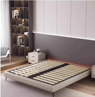 Lit double moderne 2024 en cuir de taille Queen avec fonction de massage sans tête de lit Dossier squelette au design simple pour la chambre principale