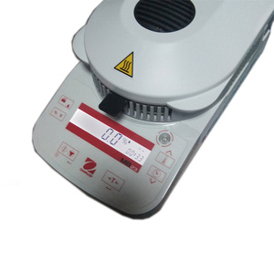 Analizador de Humedad de Granos OHAUS MB23, Medidor de Humedad de Cereales con Calentamiento Infrarrojo de 110g y Interfaz de Datos - Product Image 1