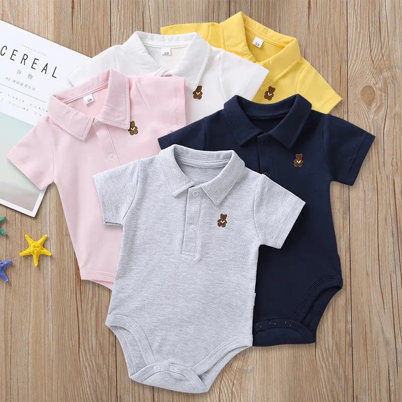 Özel etiket yaz yenidoğan bebek giysileri düz renk % 100% pamuk Polo Bodysuit nakış bebek erkek kız Romper