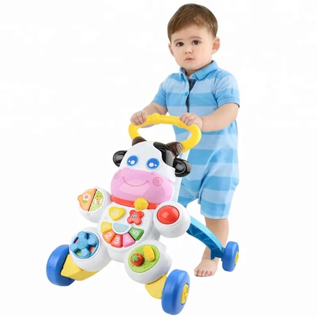Hot sale cow page turning key piano key multifunctional 4 in 1 baby walker with music and light