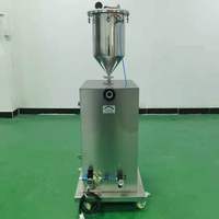 Machine de remplissage semi-automatique manuelle à seringue en plastique pour crème cosmétique visqueuse en gel préremplie