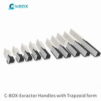 Poignée d'extraction ZSTC C-BOX de forme trapézoïdale, Type 2, RAL9005, sans goupille d'alignement 20817-856 20817856