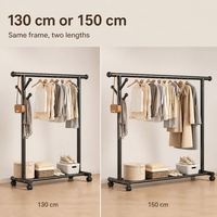 Porte-vêtements robuste en fer avec cadre en tube rond de 32 mm, niveau de rangement inférieur et roulettes, pour balcon, chambre et dressing