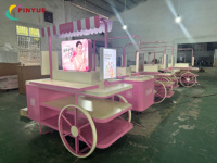 Kiosque mobile personnalisé rose pour vernis à ongles avec éclairage LED, idéal pour les événements en centre commercial et la promotion de marques de beauté et d'art des ongles