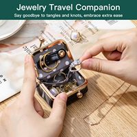Boîte de rangement à bijoux de voyage miniature en gros, étui à bijoux portable de luxe en similicuir motif crocodile avec fermoir Kiss Lock