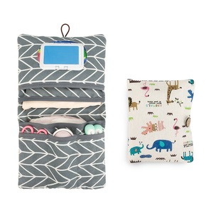 Bolsa portátil para guardar pañales de bebé con espejo y bolsillos para uso en viajes - Product Image 1