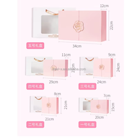 Boîte rigide en papier kraft écologique magnétique personnalisée rose clair élégante et très vendue pour l'emballage de cadeaux de parfum