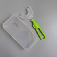 Bébé brosse à dents en forme de u 360 brosse en silicone souple avec emballage en boîte pp