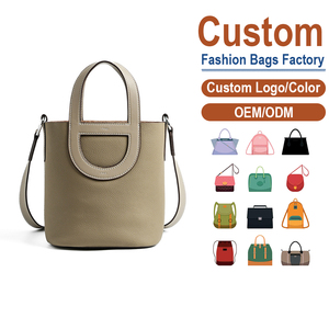 Sac seau mini en cuir de vachette gris éléphant, style décontracté, avec poignée contrastante, personnalisation en petite série - Product Image 1