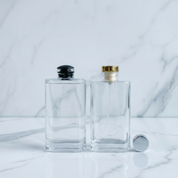 Bouteille diffuseur rectangulaire en verre transparent de 150 ml avec bouchon en caoutchouc, double usage pour parfum d'intérieur et nettoyant visage - Vente en gros