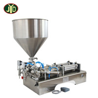 Machine de remplissage de pâte de sauce d'arachide liquide hautement visqueux de jus de miel de 2 têtes pneumatiques horizontales