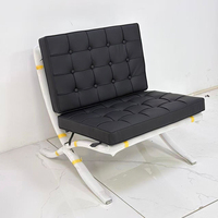 Fauteuil de style barcelloñais en cuir véritable italien, design minimaliste et ergonomique