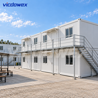 VICDOWEX Maison Conteneur Modulaire Préfabriquée Portable à Montage Rapide Design Contemporain pour Bureau de Chantier Éloigné et Dortoir