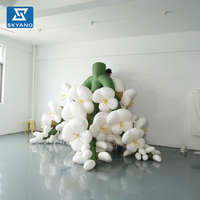 Modèle de pagode gonflable géante blanche personnalisée en forme de fleur pour événements en plein air, publicité dans les parcs, décoration florale gonflable