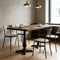 Pieds de table en fonte noirs à quatre griffes, base métallique stable, design croisé, OEM ODM pour hôtel, bureau, restaurant