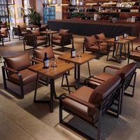 Ensemble table et chaises vintage en bois pour café, café, boutique commerciale, canapés rembourrés en cuir marron pour restaurant