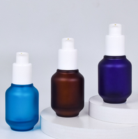 Flacon pompe en verre de 30 ml personnalisé (forme d'ampoule, couleur personnalisée) OEM pour sérum de soin de la peau, crème pour le visage, huile essentielle, crème BB, emballage cartonné