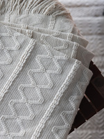 Großhandel Nordische Feder-Garn-Strickdecke mit Quasten, Weiche Geometrische Ganzjahres-Sofa-Bett-Luxusdecke