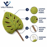 Jouet en peluche feuille de Monstera à la catnip, en tissu vert bouclé, avec tige en bois, rembourré de catnip 45g