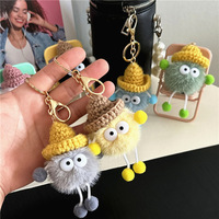 Vente en gros de porte-clés en fausse boule de fourrure de lapin porte-clés en peluche avec pompon et fausse boule de charbon