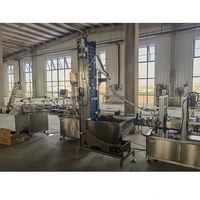 Remplissage de bouteilles d'huile de cuisson comestible entièrement automatique Remplisseur de bouteilles d'huile de palme d'olive végétale, bouchage et étiquetage Ligne de machines à emballer