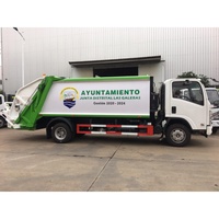 Camion compacteur de déchets Isuzu ELF 4x2, camion à chargement arrière, véhicule de compression des déchets