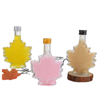 Fabricant de petites bouteilles de sirop d'érable et de vin Vente en gros 250ml 100ml 50ml Mini bouteilles en verre avec feuille d'érable