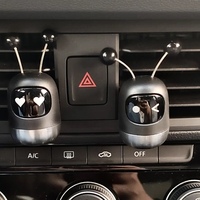 Désodorisant de voiture à modélisation Robot créatif Clip pour bouche d'aération de parfum de voiture solide Diffuseur d'arômes de voiture