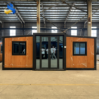 Maison conteneur préfabriquée de luxe moderne en acier de 20/30/40 pieds, extensible avec salle de bain et cuisine, idéale pour les villas