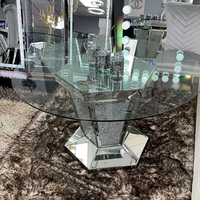 Table basse ronde en verre avec aspect diamant écrasé et base miroir