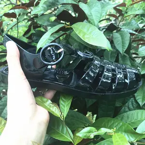 फैशन छात्र की रोमन सैंडल खोखले बाहर रेट्रो फ्लैट पैर की अंगुली जेली लड़कियों पार-सीमा सैंडल jieyang फैशन जूते के लिए महिला
