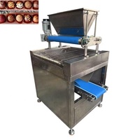 Machine automatique de distribution de noix de 600 mm, machine à saupoudrer de noix concassées pour les produits chocolatés