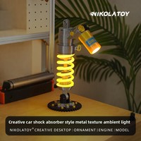 Lampe de bureau créative de style amortisseur de voiture, finition métallique imprimée en 3D, modèle décoratif de bureau en plastique, boîte en carton