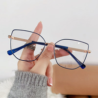 Lunettes optiques de créateur œil de chat anti-lumière bleue pour femmes 2026, monture métallique rétro, verres photochromiques gris