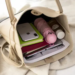 Womenの新房のメッセンジャーバッグKoreanバージョントート浮遊バッグ学生携帯電話の変更ソフトレザーハンドバッグ