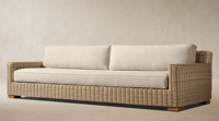 Canapé d'extérieur en osier élégant, résistant aux intempéries, avec cadre tressé à la main et coussins beiges, mobilier de salon modulaire pour jardin