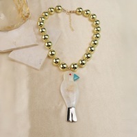 Collier populaire avec pendentif oiseau tridimensionnel perlé et tissé, et chaîne de cou luxueuse