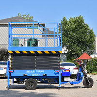 Plateforme de travail aérienne hydraulique à ciseaux montée sur tricycle électrique, 6-12 m, 500 kg