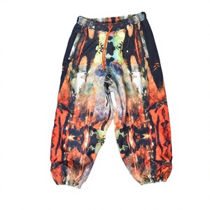 Pantalones de Esquí con Estampado de Llamas al por Mayor en Varios Colores con Tela Impermeable, Forro Polar Cálido, Dobladillo Elástico y Estilo Holgado - Product Image 1