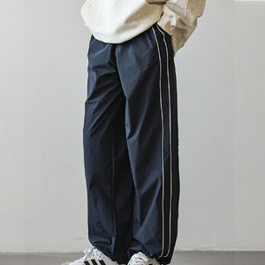 Pantaloni sportivi larghi e alla moda da uomo pantaloni sportivi larghi e Casual in Nylon pantaloni larghi e alla moda autunnali da uomo - Product Image 1