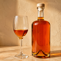 Bouteille en verre transparente vide pour vodka, vin, gin et spiritueux, avec base lourde, col long, épaule arrondie et capacité personnalisée OEM