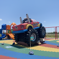 Château gonflable commercial combiné Monster Truck avec toboggan pour location événementielle