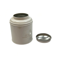 Boîte à thé ronde de luxe hermétique en métal noir mat pour thé en vrac café avec logo en relief en fer blanc