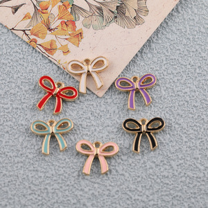 Pendentif en alliage Sweet Bow pour la fabrication de boucles d'oreilles, accessoires de bijoux DIY, forme irrégulière plaquée bleu, noir, violet - Product Image 1