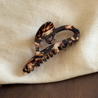 Pince à cheveux minimaliste française en acétate, motif cœur évidé, texture écaille de tortue classique, pince crabe polyvalente pour femme