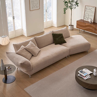 Grand canapé moderne italien en tissu pour villa d'hôtel Forme spéciale de SPARKLE Style crème minimaliste Salon en tissu à pieds hauts