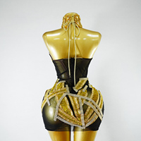 Robe de scène de luxe pour femme, design exclusif, ornée de strass dorés, avec corset en maille noire micro-élastique et armatures, pour spectacle de haute couture