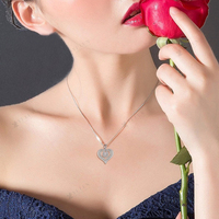 YILUN Pendentif coeur en pierre de CZ dansante en argent sterling 925 plaqué rhodium Ailes d'ange Pendentif coeur d'amour pour les femmes
